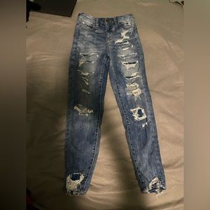 DARK BLUE AMERICAN EAGLE RIPPED JEANS